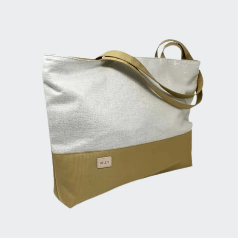 Elegáns bézs strandtáska Cordura anyagból, cipzáras záródással.